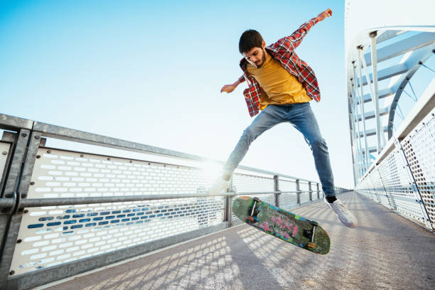 istock Skateboarding and successfully doing tricks and jumps 1312349625