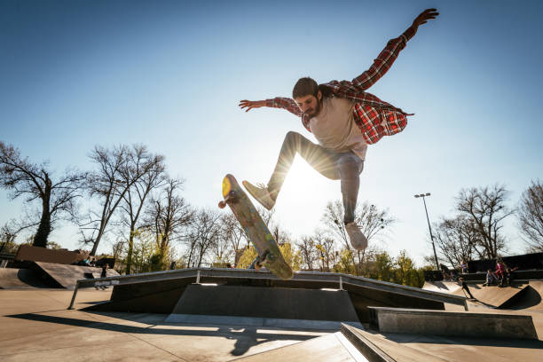 istock Skateboarding in skate park and doing stunts and jumps 1312349768