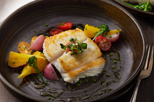 Pan Seared Halibut with Roasted Golden Beets, Cherry Tomatoes, Radish's and Broccolini