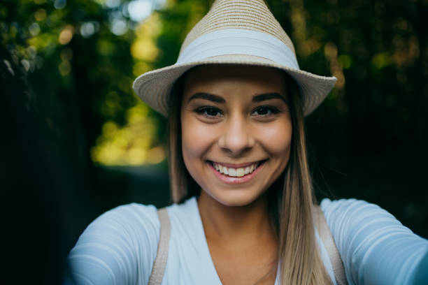 istock Happy woman hiking in mountains 1312350724