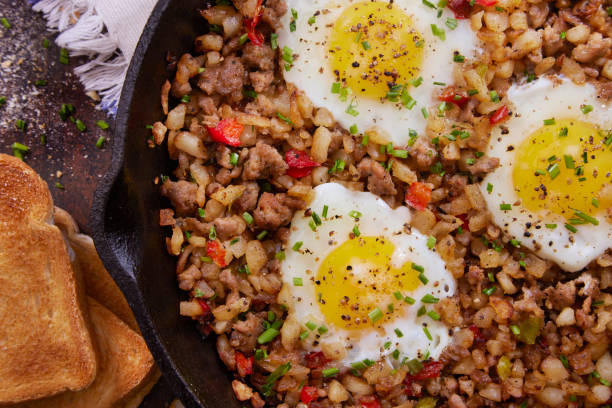 istock Sausage Skillet Scramble with Hash Browns and Fried Eggs 1312350940