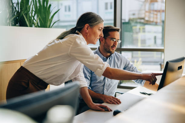 istock Business people working together in office 1312352038