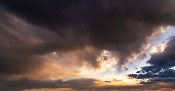 istock Sunset sky background. Beautiful sunset after rain, with bright ] dramatic clouds. 1312352080