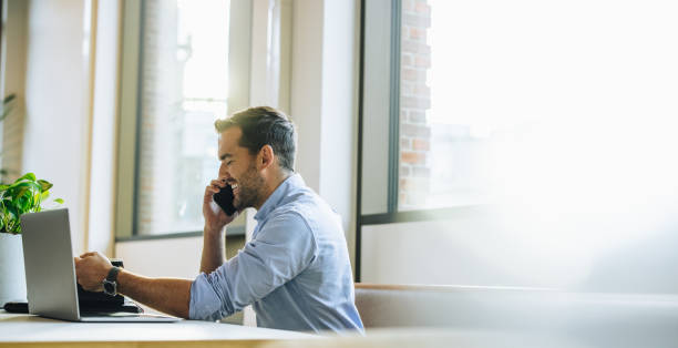 istock Businessman talking with client on smart phone 1312352768