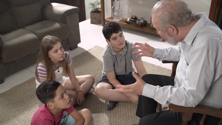 Grandpa telling story to grandchildren