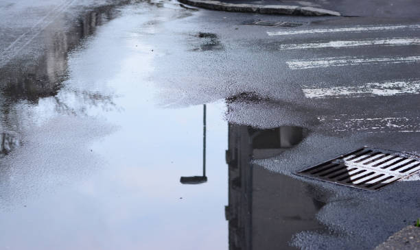 istock a reflection in the plash in the street 1312354021