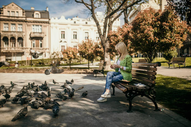 lunch in park, woman eating a vegetable salad outdoors