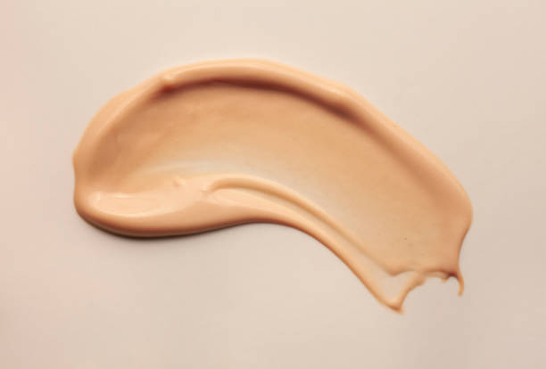 istock Smudged make-up gradient texture palette creamy matte beige concealer foundation CC or BB-cream powder on white isolated background 1312358001