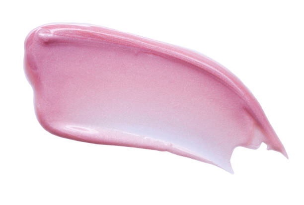istock Smudged pink make-up gradient texture palette creamy matte beige purple concealer foundation CC or BB-cream powder on white isolated background 1312359404