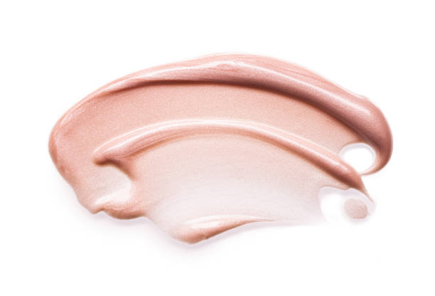 istock Smudged make-up gradient texture palette creamy matte beige concealer foundation CC or BB-cream powder on white isolated background 1312359430