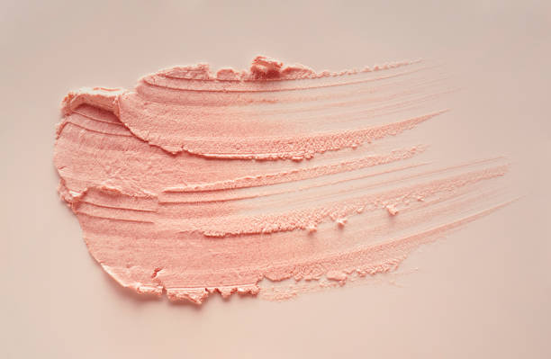 istock Smudged make-up gradient texture palette creamy matte beige concealer foundation CC or BB-cream powder on white isolated background 1312360506