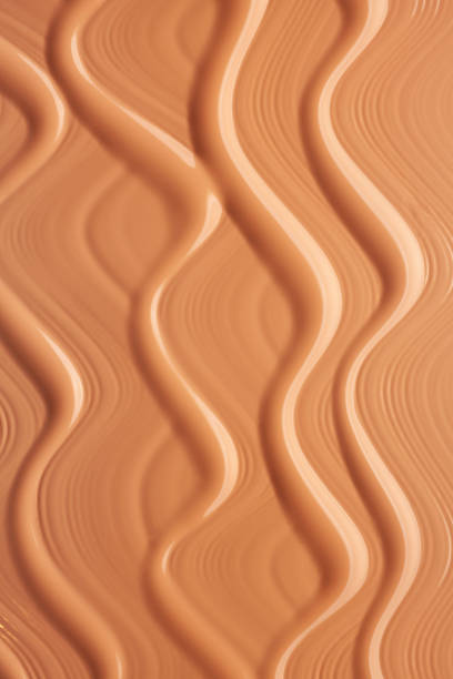 istock Smudged make-up gradient texture palette creamy matte beige concealer foundation CC or BB-cream powder on white isolated background 1312360927