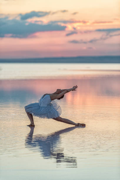 istock Ballerina dancing on the water 1312361845