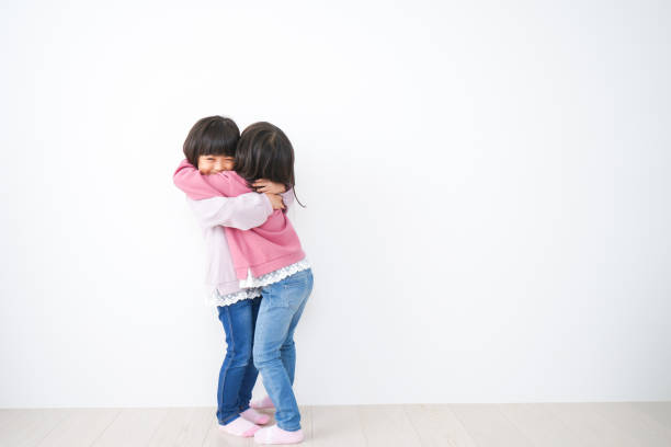 istock Little girls having fun playing 1312361886