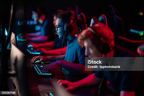 Professional Esports Players At An Online Game Tournament The Cyber Team Plays Computers And Trains Stock Photo - Download Image Now