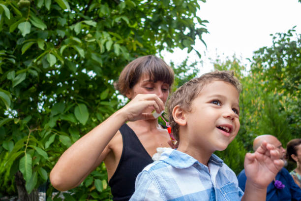 istock Mom and son play 1312367800