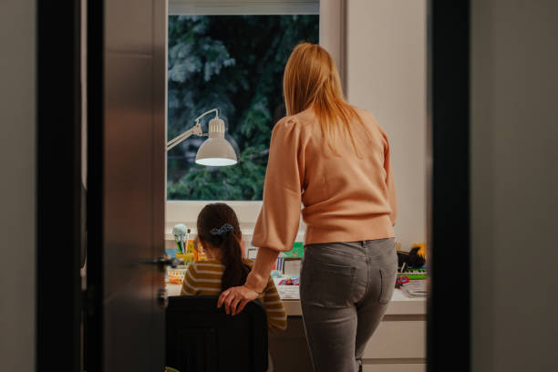 istock Mother and child doing homeschooling, 1312369285