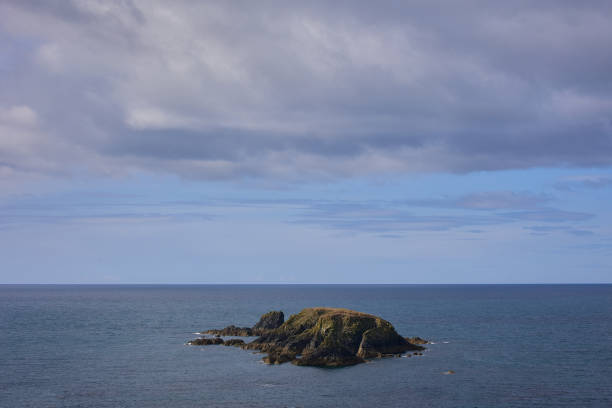 istock island-shaped rock formations surrounded by atlantic water . Kilfarrasy Beach. Co.Waterford Coastline, Ireland 1312374255