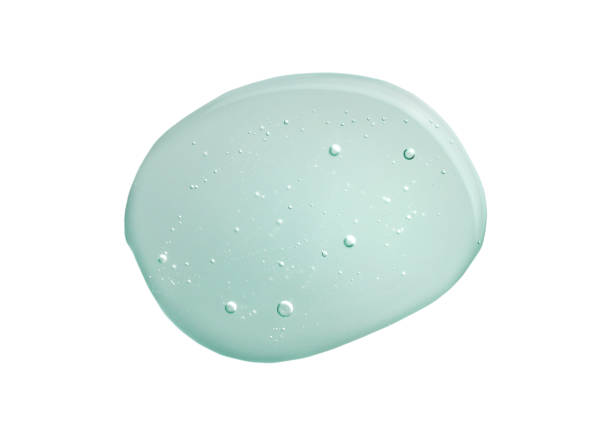 istock Cosmetic gel or cleansing foam bubbles turquoise blue green gray lotion emulsion cream multi-colored background 1312377470