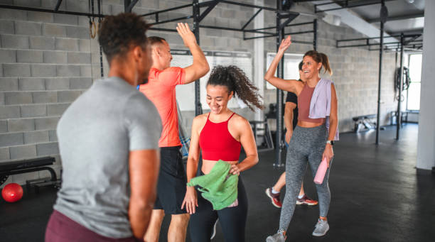 istock Multi-Ethnic Group of Workout Friends Arriving at Gym 1312385372
