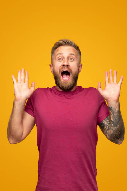 istock Surprised bearded man screaming loudly 1312386371