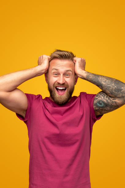 istock Shocked man screaming at camera 1312386374