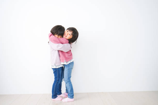 istock Little girls having fun playing 1312393572