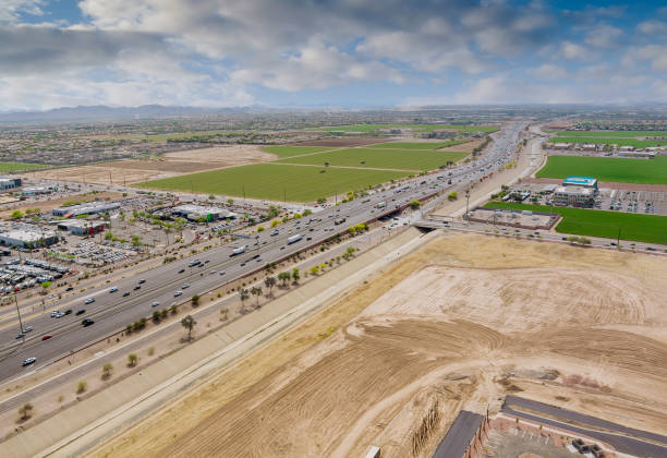 istock Top view over the traffic backed up during rush hour on Interstate highway, expressway near phoenix on Arizona 1312393576
