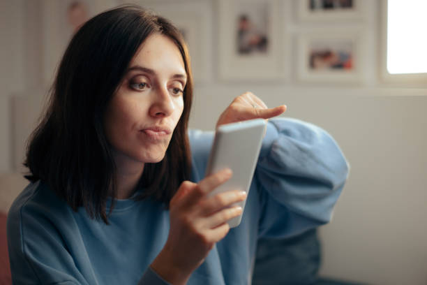 istock Woman Using Dating Up Checking on Partner Profiles 1312395253