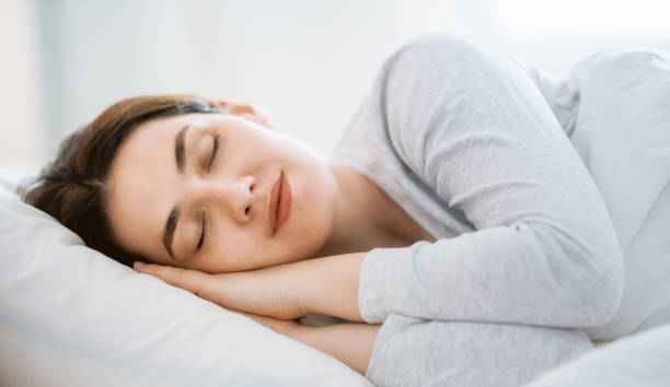 istock young woman is sleeping 1312396806