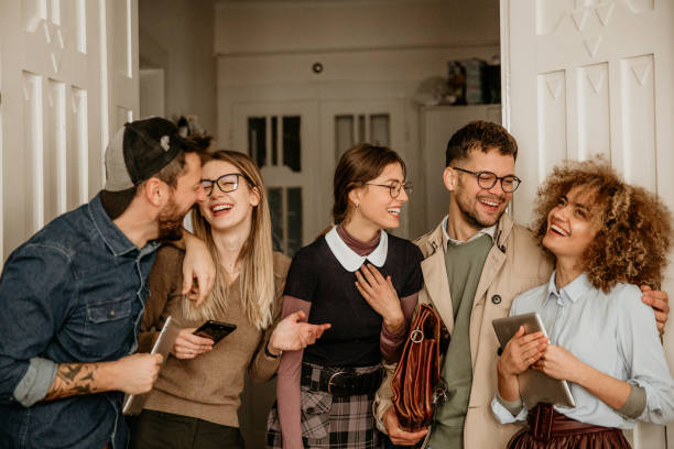istock Large group of smiling smart casual dressed people 1312402399