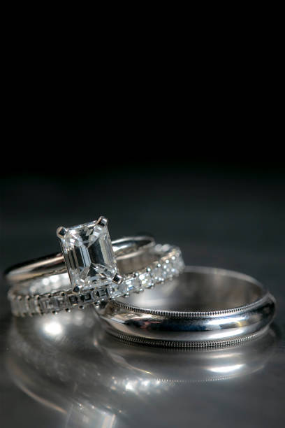 istock Wedding rings for a couple getting married placed on a display table 1312402405