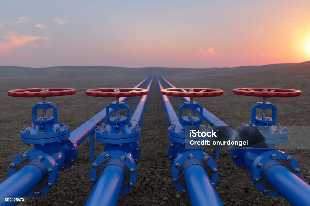 Oil Or Gas Transportation With Blue Gas Or Pipe Line Valves On Soil And Sunrise Background Natural Gas Stock Photo