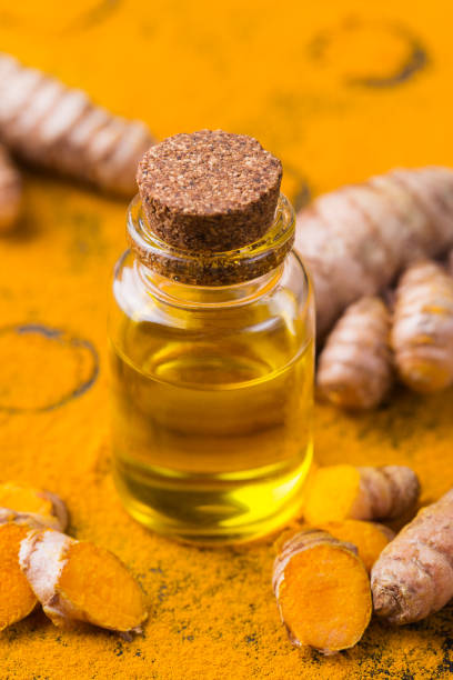 istock Turmeric essential oil, orange root and powder, beauty and spa 1312411143