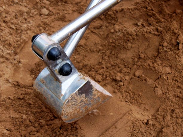 istock Excavator Bucket and a sand 1312414917
