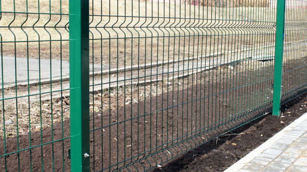 istock Metal fence wire so close 1312415080