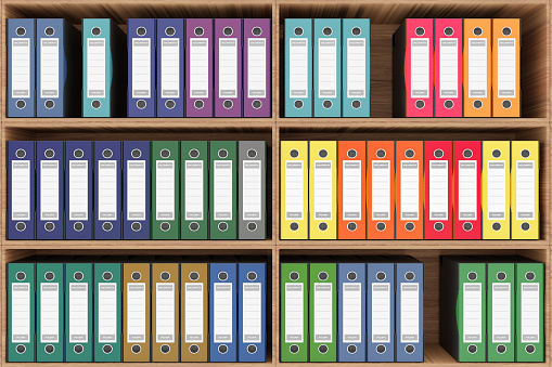 3D illustration. Series of folders of various colors wallets for document classification. Database. \nLibrary shelf database.