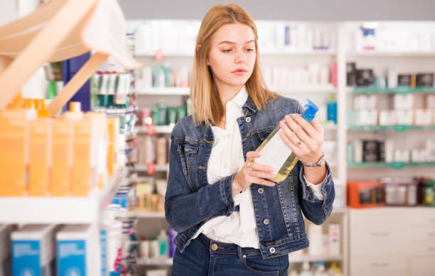 istock Smiling young girl chooses medicine 1312418742