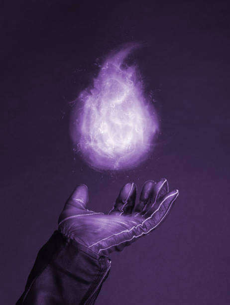 istock Levitating magic fire flame on a special glove - Concept of magic 1312419659