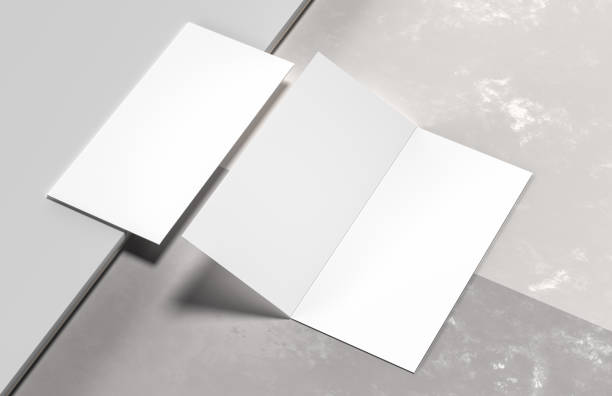istock Bi-fold brochure mock up isolated on white background. 3D illustration. 1312423071