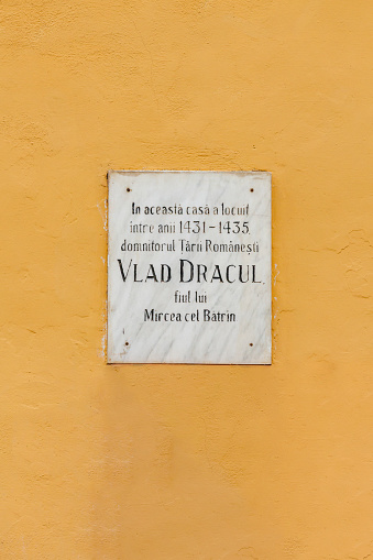 Plaque outside Vlad Dracul House, birthplace of Vlad Dracula, Sighisoara, Transylvania, Romania.