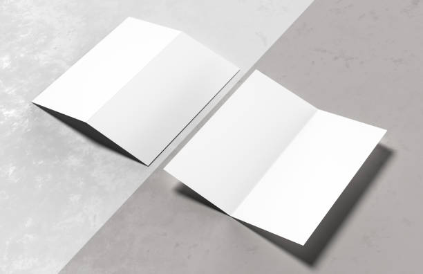 istock Bi-fold brochure mock up isolated on white background. 3D illustration. 1312423377