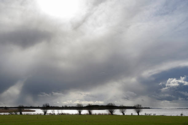 Storm clouds over the delta of the river and Ketelmeer IJssel in Overijssel, The Netherlands during early springtime.