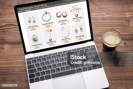 istock Online shop website for handmade jewelry viewed on laptop computer 1312425739