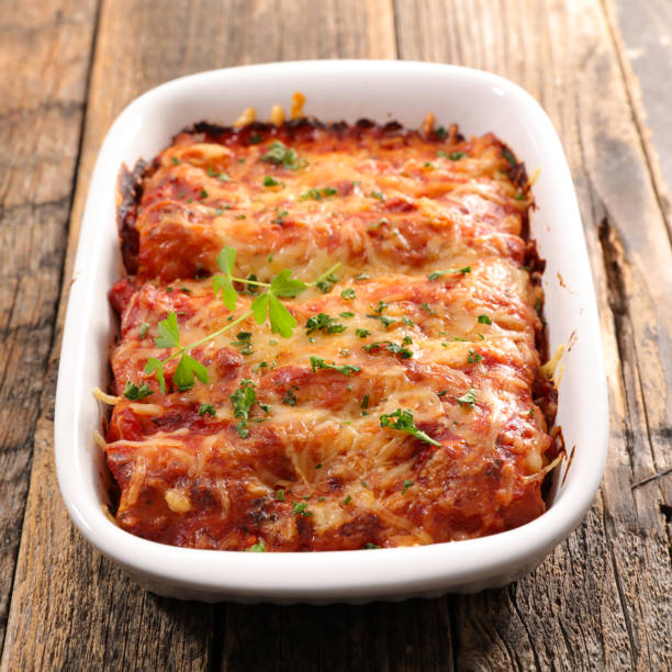 istock cannellonni- pasta with minced beef,  tomato sauce and cheese 1312425867