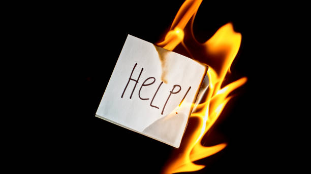 istock Close-up of blue paper with inscription 'HELP' 1312427645