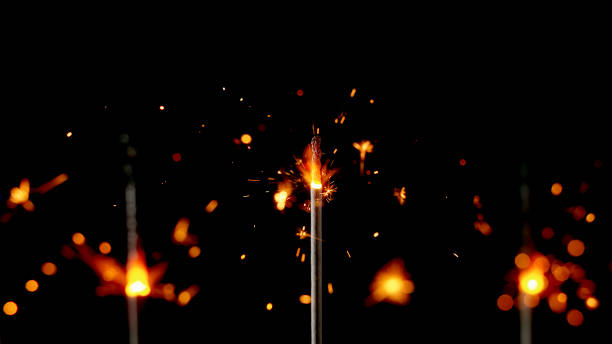 istock Close-up of burning sparkle sticks with sparks 1312427721