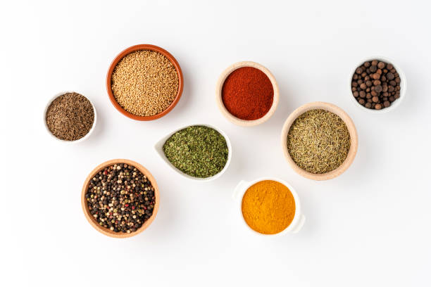 istock Collection of spices isolated on white background. Top view 1312428402