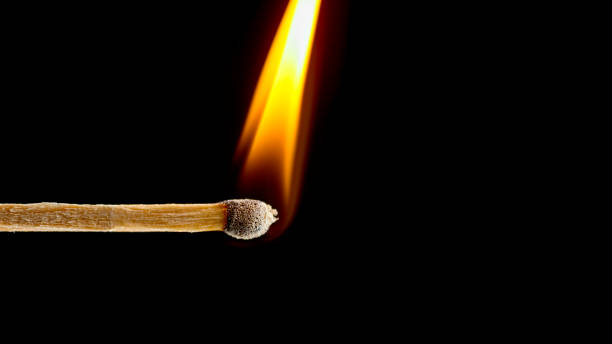 istock Close-up of matchstick flame 1312428583