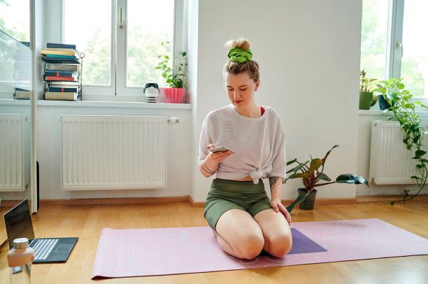istock Downloading some new workout apps 1312429288